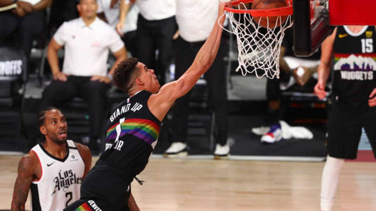 开云下载-公牛队前锋送上漂亮空接，赢得球迷掌声